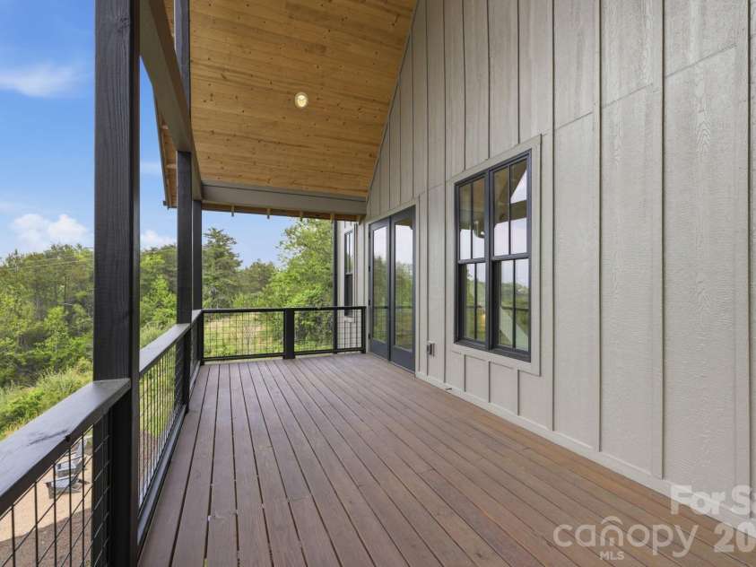 244 Westridge Farm Road, Asheville, NC 28804.  MLS# CAR4371030, YatesRealty ID 24441. Covered, vaulted back porch