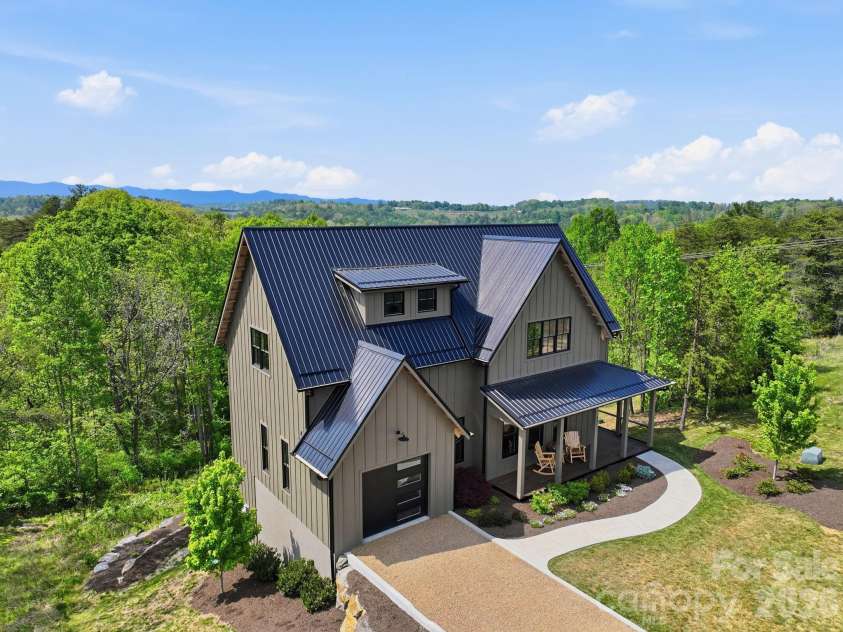 244 Westridge Farm Road, Asheville, NC 28804.  MLS# CAR4371030, YatesRealty ID 24441. Front of property & adjoining 16 acre conservancy land
