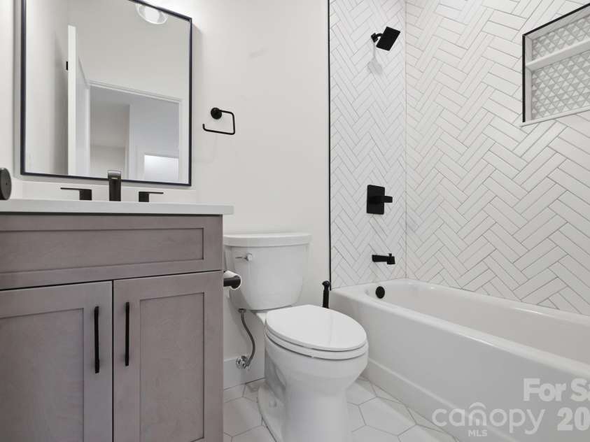 244 Westridge Farm Road, Asheville, NC 28804.  MLS# CAR4371030, YatesRealty ID 24441. Lower level bathroom