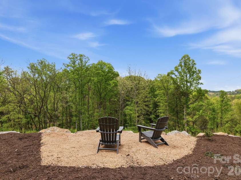 244 Westridge Farm Road, Asheville, NC 28804.  MLS# CAR4371030, YatesRealty ID 24441. Private backyard lounging area