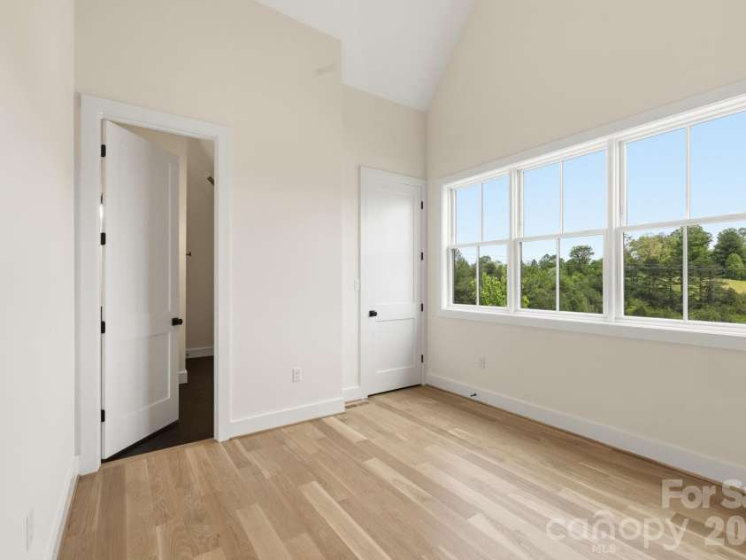 244 Westridge Farm Road, Asheville, NC 28804.  MLS# CAR4371030, YatesRealty ID 24441. Upstairs bedroom #2 and ensuite full bathroom