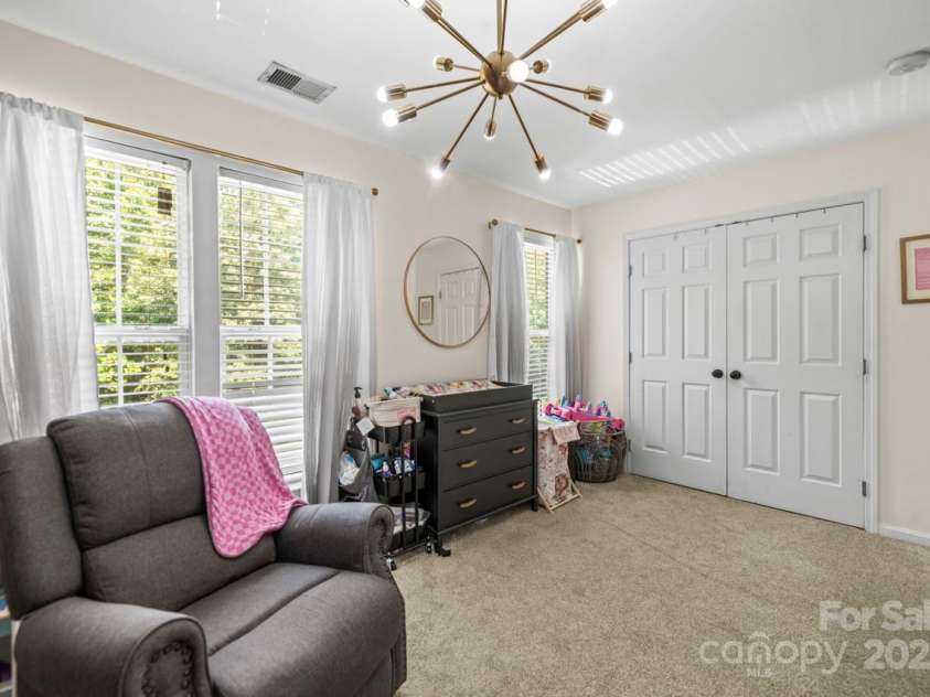 7881 Mariners Pointe Circle, Denver, NC 28037.  MLS# CAR4267162, YatesRealty ID 24443. Large secondary bedroom with updaded lighting and large closet!