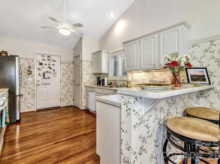 333 Charlestown Drive, Hendersonville, NC 28792.  MLS# CAR4354856, YatesRealty ID 24452. Breakfast bar at kitchen