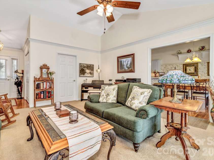 333 Charlestown Drive, Hendersonville, NC 28792.  MLS# CAR4354856, YatesRealty ID 24452. Great room looking into dining area