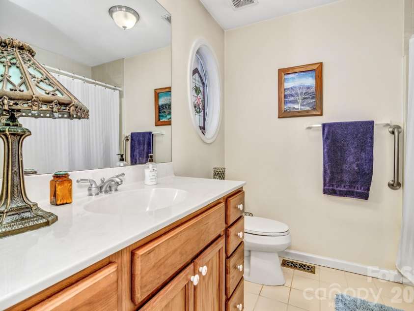 333 Charlestown Drive, Hendersonville, NC 28792.  MLS# CAR4354856, YatesRealty ID 24452. Guest bathroom