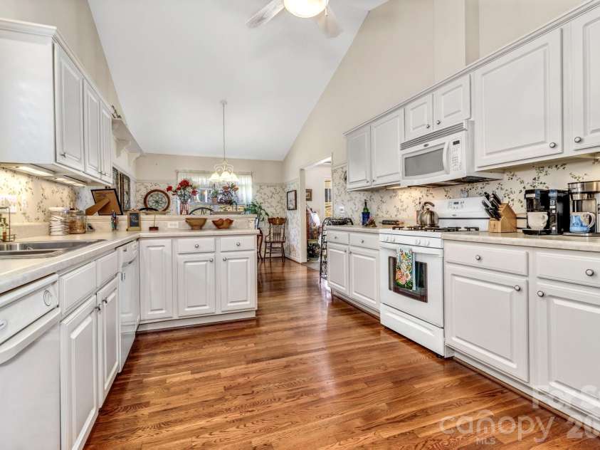 333 Charlestown Drive, Hendersonville, NC 28792.  MLS# CAR4354856, YatesRealty ID 24452. Kitchen looking into dining area