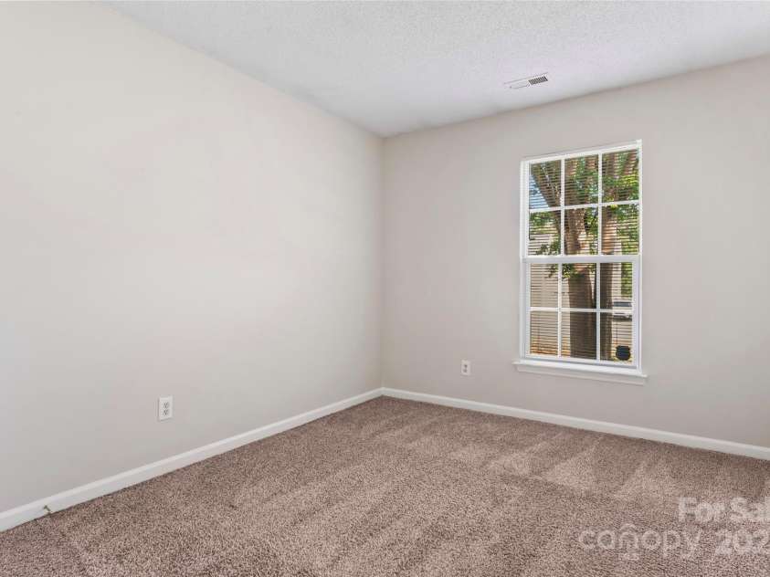 8724 Tweedsmuir Glen Lane, Charlotte, NC 28215.  MLS# CAR4274200, YatesRealty ID 24452. Bedroom 2