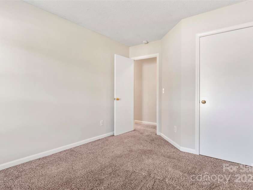 8724 Tweedsmuir Glen Lane, Charlotte, NC 28215.  MLS# CAR4274200, YatesRealty ID 24452. Bedroom 2