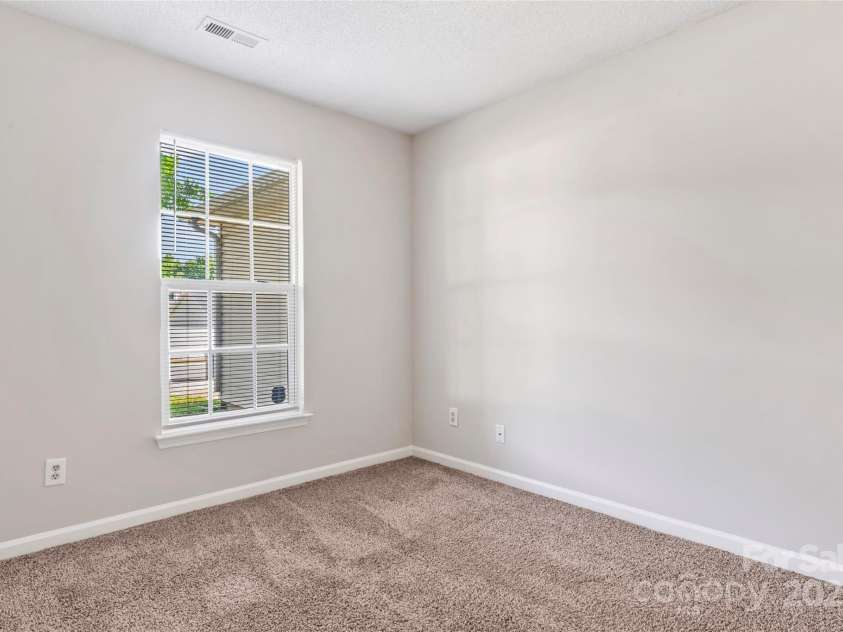 8724 Tweedsmuir Glen Lane, Charlotte, NC 28215.  MLS# CAR4274200, YatesRealty ID 24452. Bedroom 2