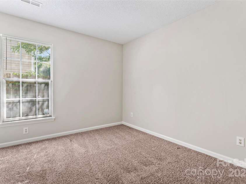 8724 Tweedsmuir Glen Lane, Charlotte, NC 28215.  MLS# CAR4274200, YatesRealty ID 24452. Bedroom 3