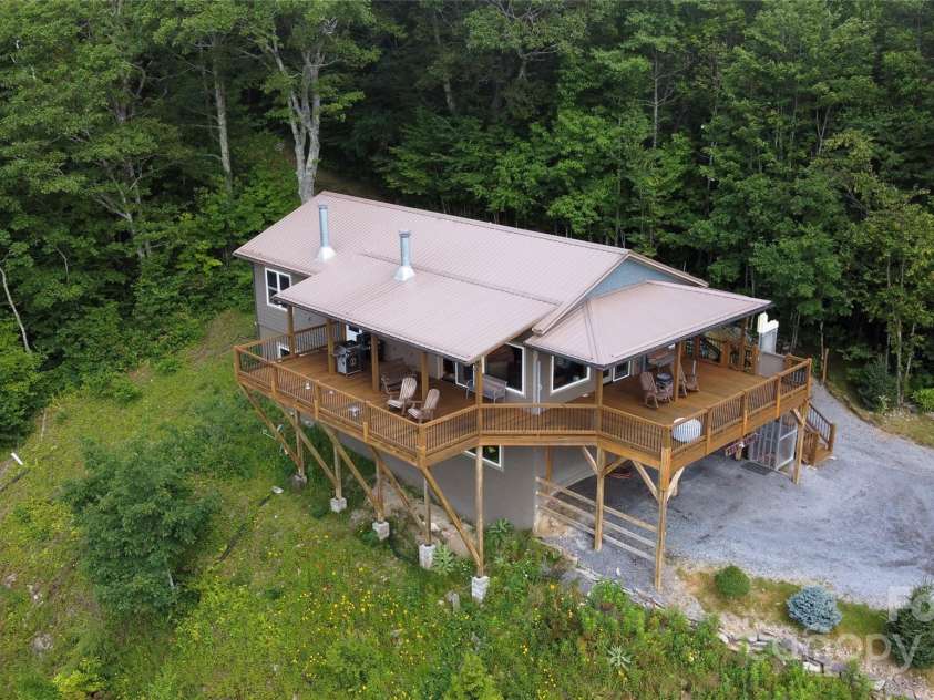 211 Sky Drive, Maggie Valley, NC 28751.  MLS# CAR4276346, YatesRealty ID 24456. Closer View from a drone