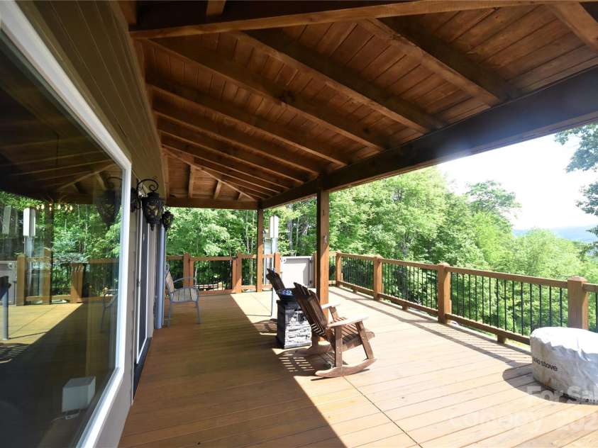 211 Sky Drive, Maggie Valley, NC 28751.  MLS# CAR4276346, YatesRealty ID 24456. Covered and open deck at the front entrance