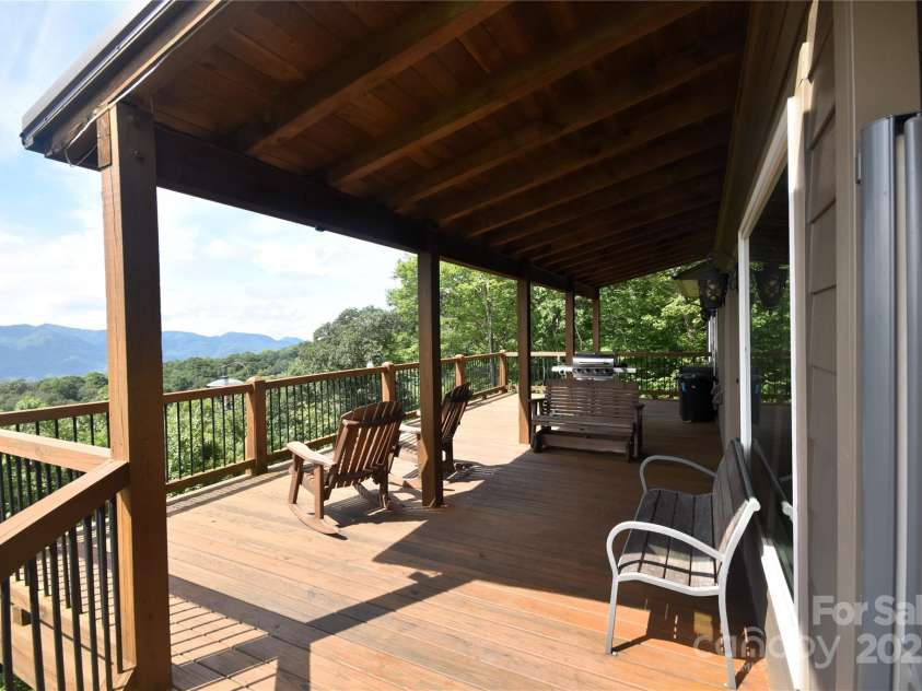 211 Sky Drive, Maggie Valley, NC 28751.  MLS# CAR4276346, YatesRealty ID 24456. Covered and open deck on the view side