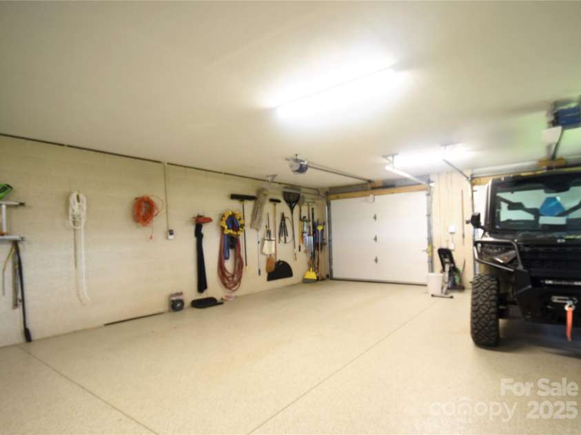 211 Sky Drive, Maggie Valley, NC 28751.  MLS# CAR4276346, YatesRealty ID 24456. Full Basement with finished ceiling and beautiful epoxy floors