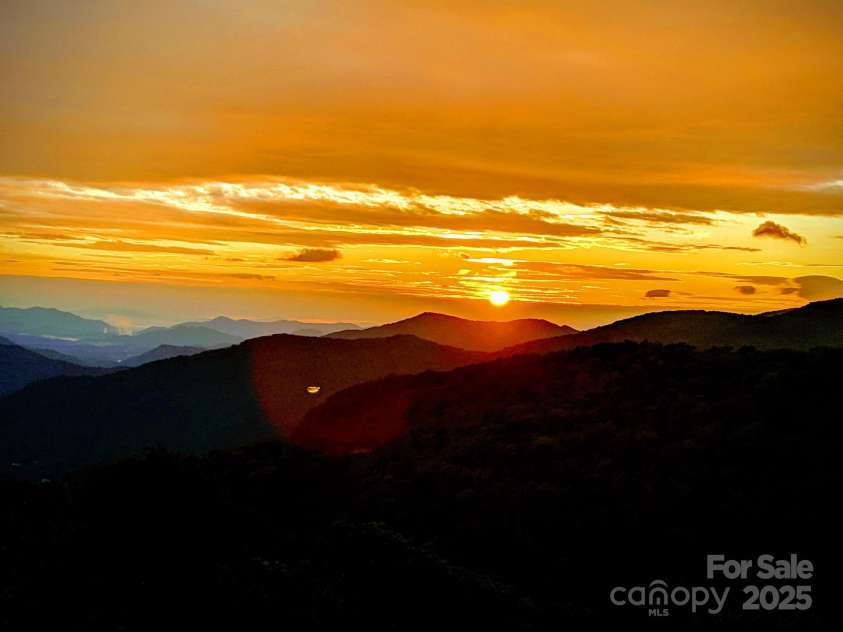 211 Sky Drive, Maggie Valley, NC 28751.  MLS# CAR4276346, YatesRealty ID 24456. Lovely Sunsets