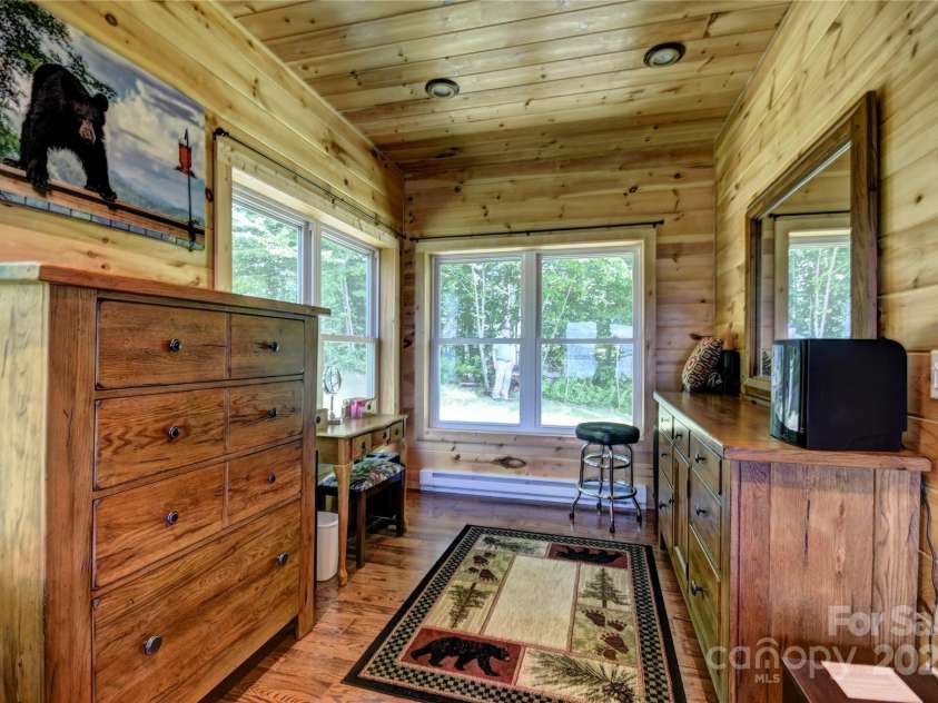 211 Sky Drive, Maggie Valley, NC 28751.  MLS# CAR4276346, YatesRealty ID 24456. More of the primary bedroom