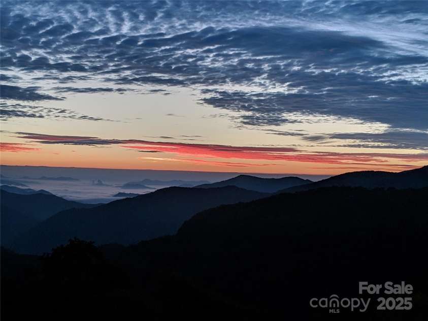 211 Sky Drive, Maggie Valley, NC 28751.  MLS# CAR4276346, YatesRealty ID 24456. The Sky has a new treat for you daily