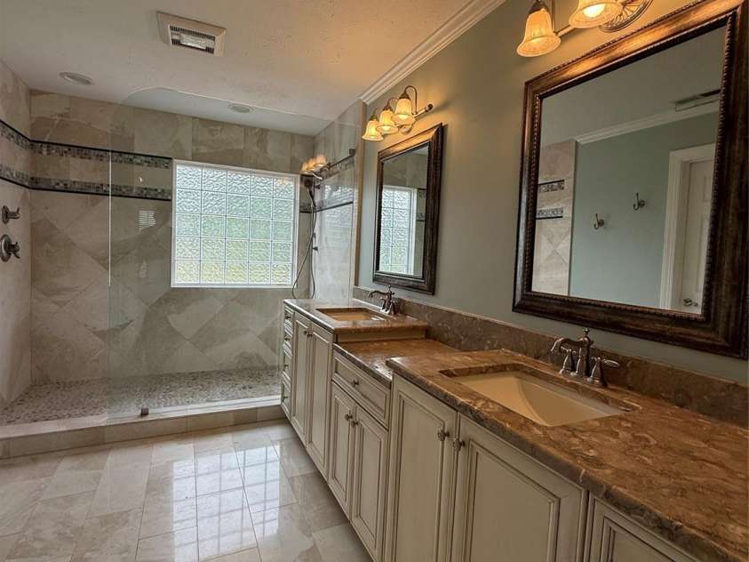 8219 Deer Drive, Harrisburg, NC 28075.  MLS# CAR4372897, YatesRealty ID 24458. Beautifully renovated Master Bath (All Custom Tile )