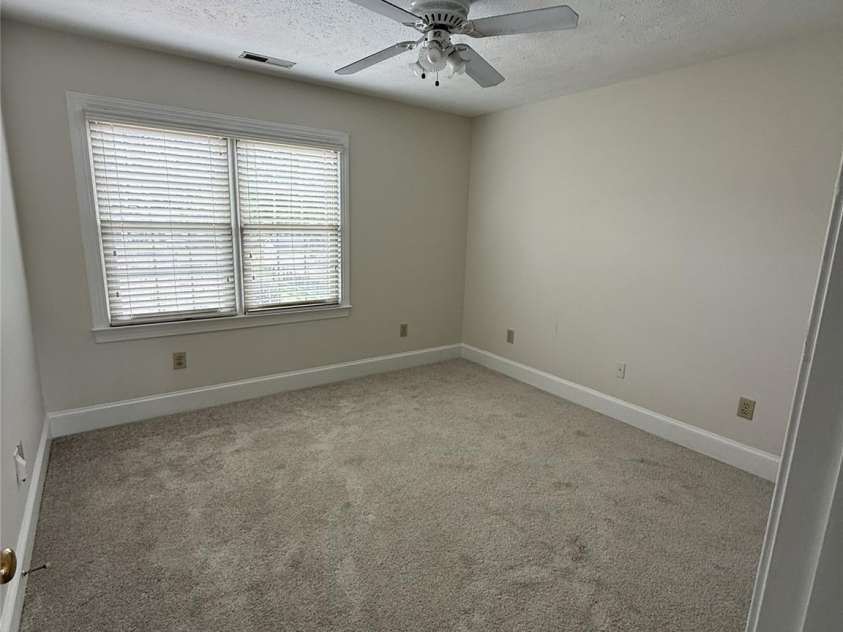 8219 Deer Drive, Harrisburg, NC 28075.  MLS# CAR4372897, YatesRealty ID 24458. Bedroom #2 + Ceiling Fan