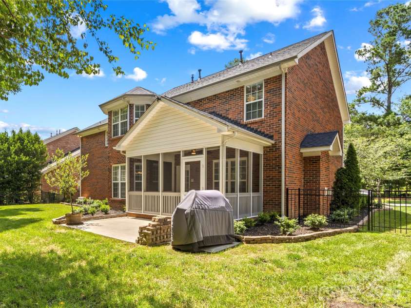 1011 Wadsworth Lane, Indian Trail, NC 28079.  MLS# CAR4273243, YatesRealty ID 24459. Screened porch and patio from out back