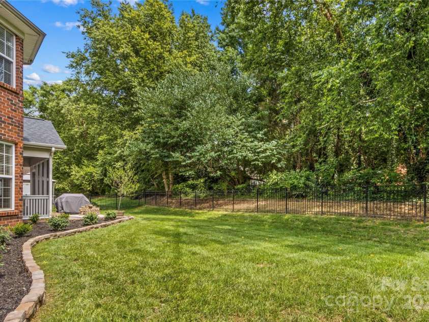 1011 Wadsworth Lane, Indian Trail, NC 28079.  MLS# CAR4273243, YatesRealty ID 24459. The back yard