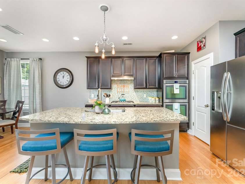 133 Glade Valley Avenue, Mooresville, NC 28117.  MLS# CAR4275294, YatesRealty ID 24460. Large Kitchen Island, gas cooktop