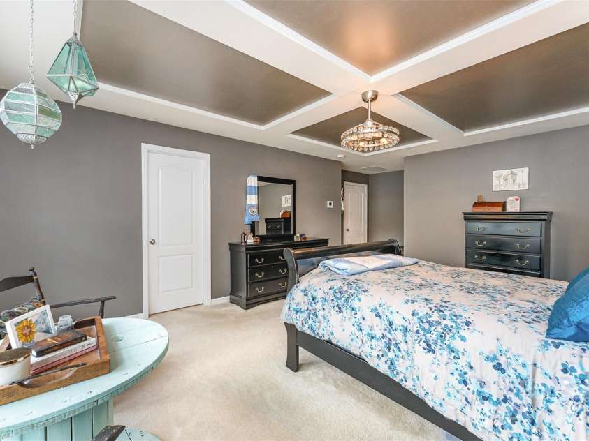 133 Glade Valley Avenue, Mooresville, NC 28117.  MLS# CAR4275294, YatesRealty ID 24460. Spacious primary bedroom with large walk in closet