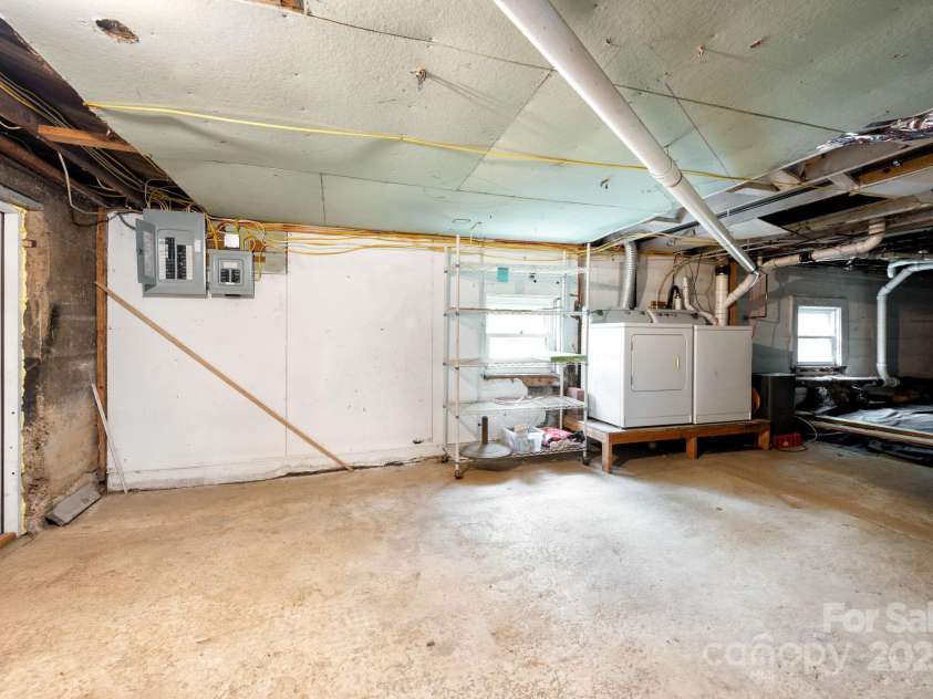 100 West Street, Asheville, NC 28801.  MLS# CAR4252473, YatesRealty ID 24461. Basement
