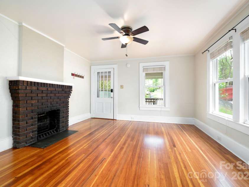 100 West Street, Asheville, NC 28801.  MLS# CAR4252473, YatesRealty ID 24461. Fireplace in Living Room