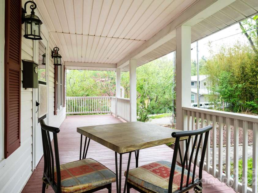 100 West Street, Asheville, NC 28801.  MLS# CAR4252473, YatesRealty ID 24461. Front porch
