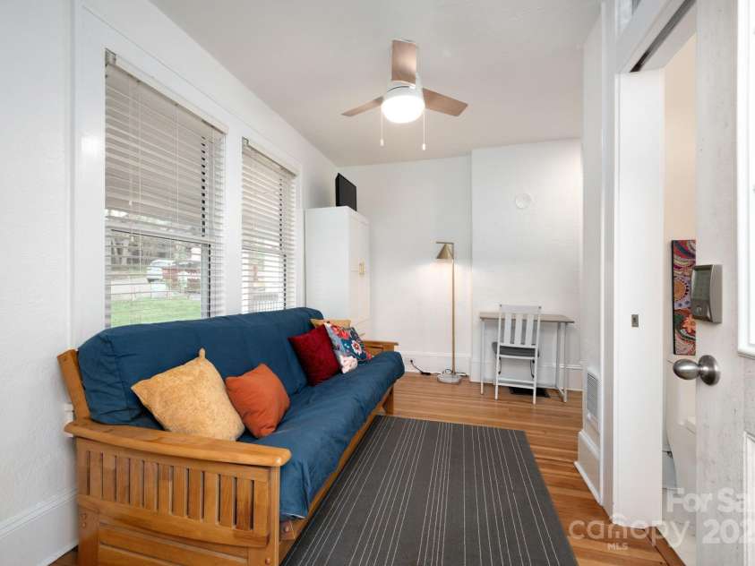 100 West Street, Asheville, NC 28801.  MLS# CAR4252473, YatesRealty ID 24461. Living area in guest/office suite