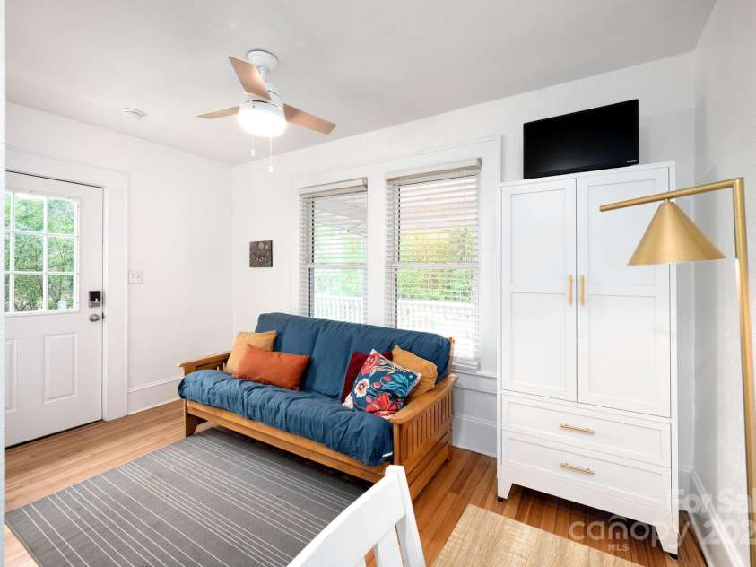 100 West Street, Asheville, NC 28801.  MLS# CAR4252473, YatesRealty ID 24461. Living area in guest/office suite