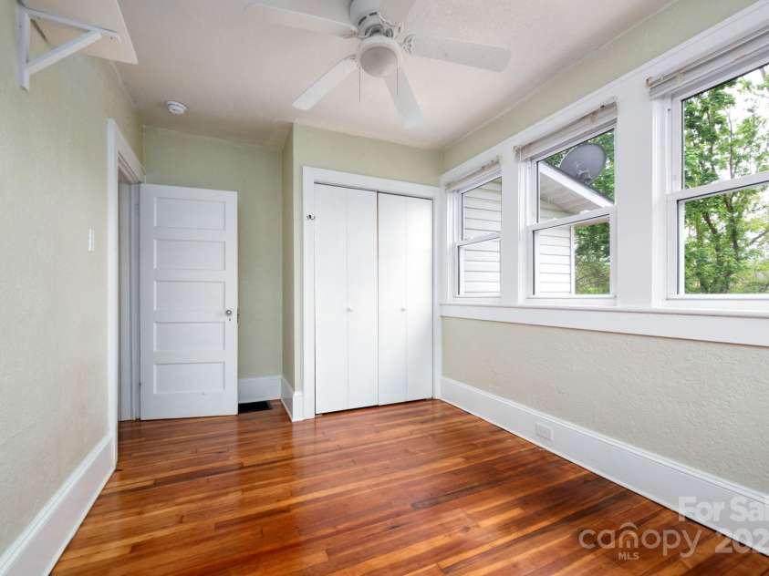 100 West Street, Asheville, NC 28801.  MLS# CAR4252473, YatesRealty ID 24461. Primary Bedroom