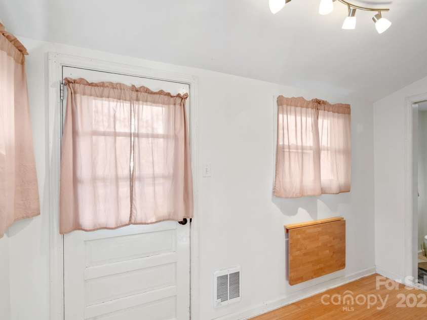 100 West Street, Asheville, NC 28801.  MLS# CAR4318906, YatesRealty ID 24461. 