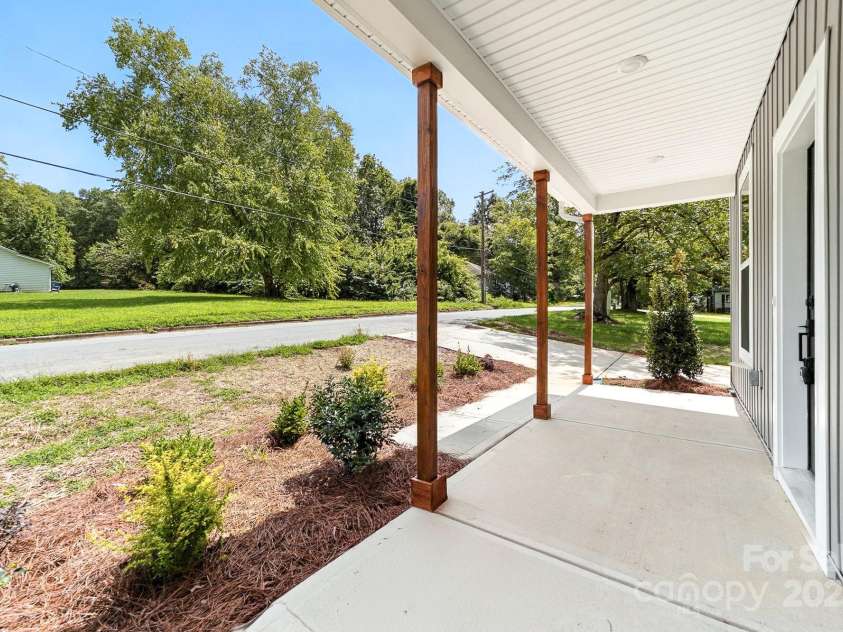 1008 Wilmouth Street, Shelby, NC 28021.  MLS# CAR4331809, YatesRealty ID 24464. Side View of the Wonderful Covered Front Porch