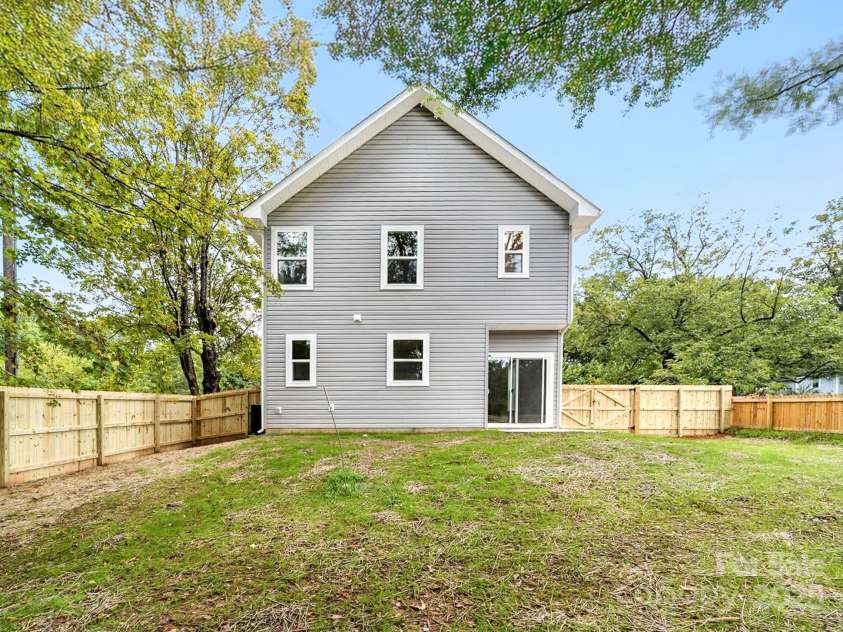 1008 Wilmouth Street, Shelby, NC 28021.  MLS# CAR4331809, YatesRealty ID 24464. View of Back of House & the Expansive Fully Fenced In Backyard