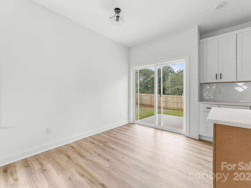 1008 Wilmouth Street, Shelby, NC 28021.  MLS# CAR4331809, YatesRealty ID 24464. View of Dining Area & Sliding Glass Doors to Patio & Backyard