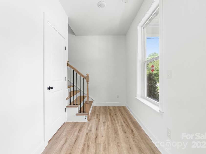 1008 Wilmouth Street, Shelby, NC 28021.  MLS# CAR4331809, YatesRealty ID 24464. View of Hallway leading to the Ascending Stairs