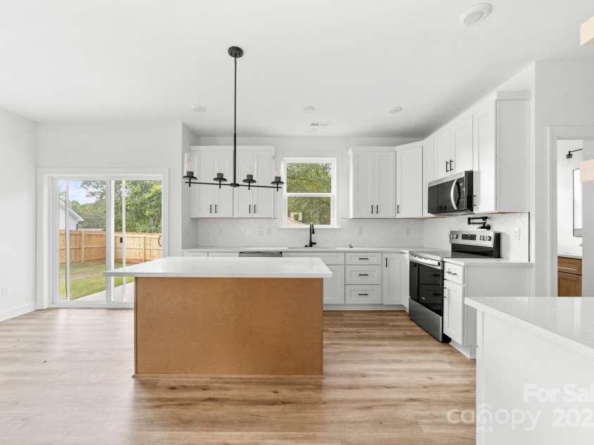 1008 Wilmouth Street, Shelby, NC 28021.  MLS# CAR4331809, YatesRealty ID 24464. View of the Awesome Kitchen & Dining Area from Front Entrance