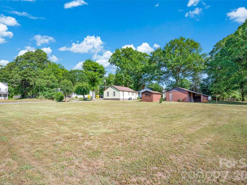 320 Cook Street, Mooresville, NC 28115.  MLS# CAR4382222, YatesRealty ID 24464. Entire property with  additional lot available for purchase