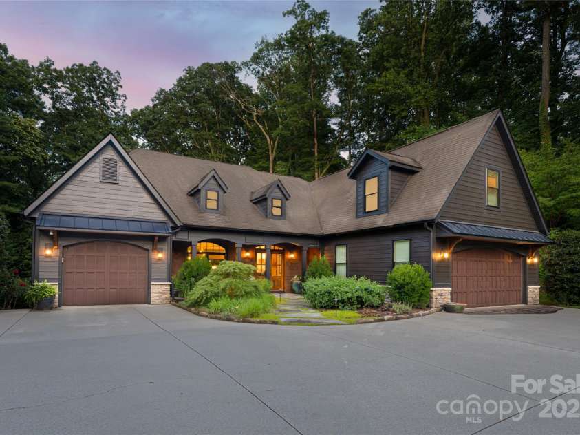 300 White Pine Drive, Hendersonville, NC 28739.  MLS# CAR4276487, YatesRealty ID 24466. 3-Car main level garage plus 1 in basement