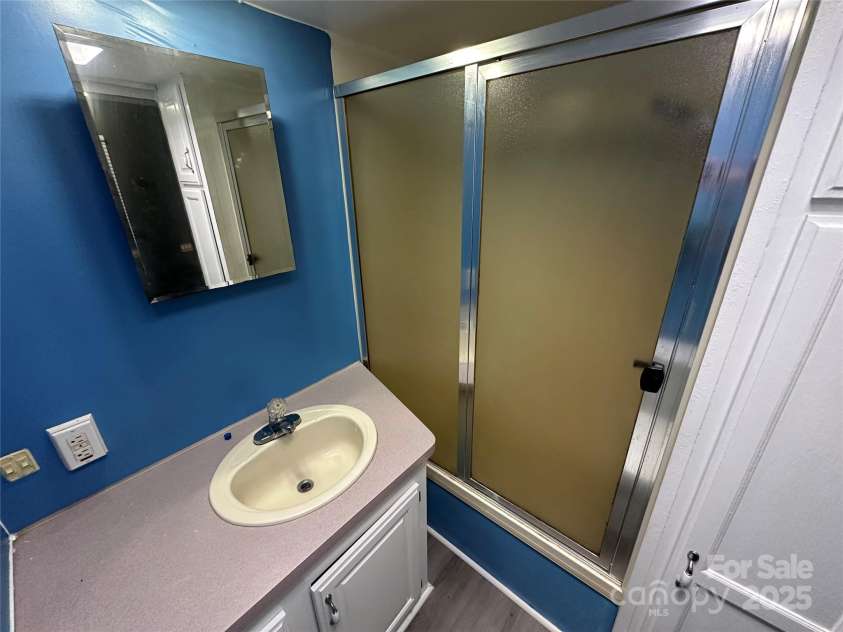 111 Deerfield Drive, New London, NC 28127.  MLS# CAR4276540, YatesRealty ID 24470. 