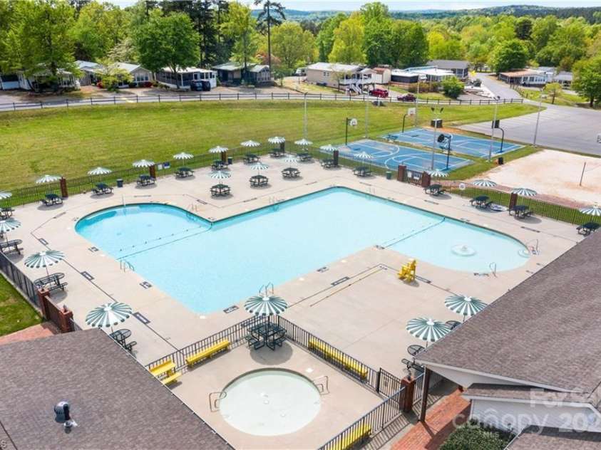 120 Clubhouse Drive Extension, New London, NC 28127.  MLS# CAR4277210, YatesRealty ID 24471. Pool