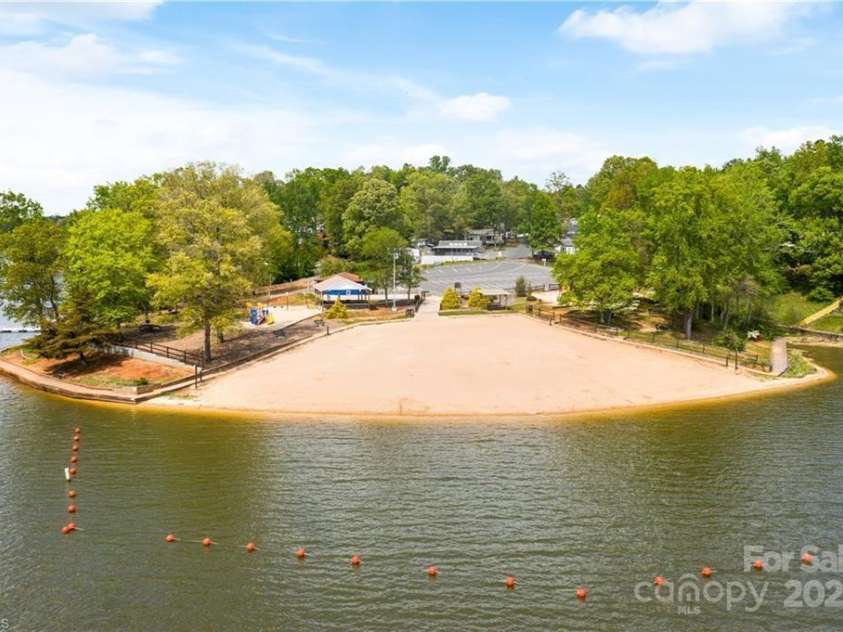 120 Clubhouse Drive Extension, New London, NC 28127.  MLS# CAR4277210, YatesRealty ID 24471. Sandy Beach