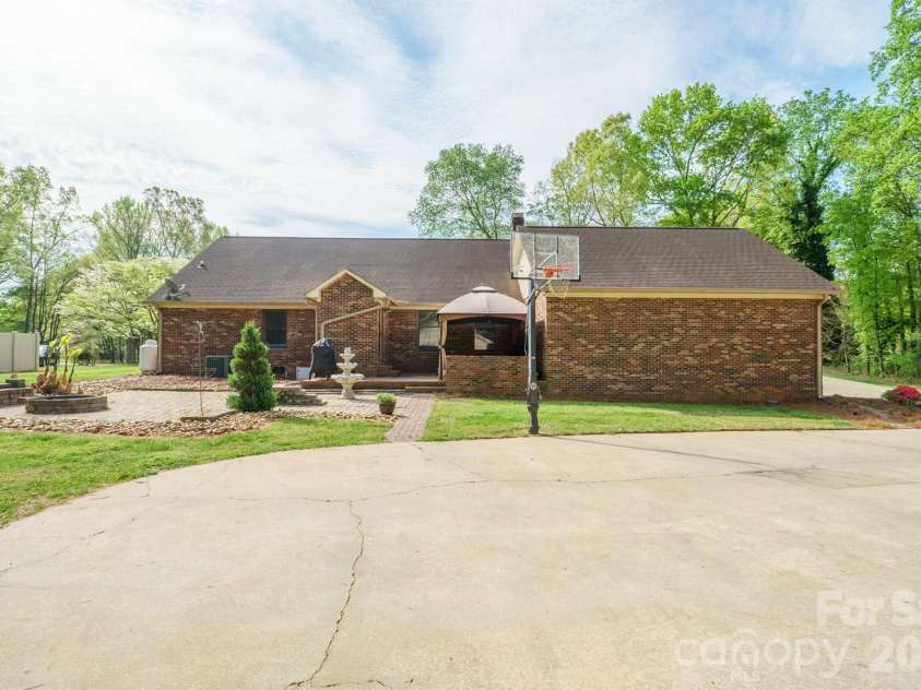 209 Frontier Circle, China Grove, NC 28023.  MLS# CAR4330628, YatesRealty ID 24471. Back of House View