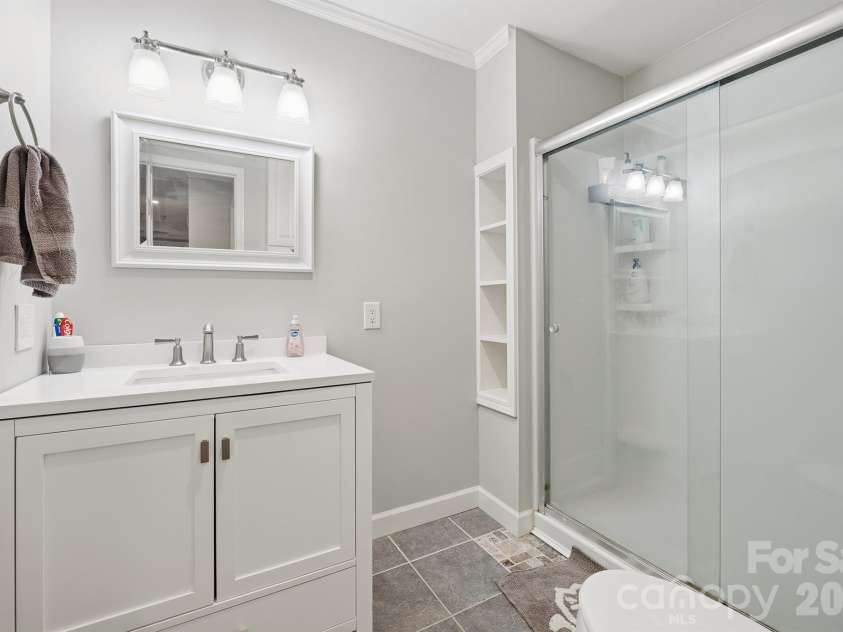 209 Frontier Circle, China Grove, NC 28023.  MLS# CAR4330628, YatesRealty ID 24471. Hall Bathroom