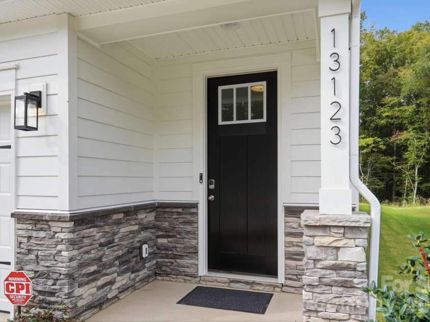 13123 Foxberry Road, Charlotte, NC 28213.  MLS# CAR4373503, YatesRealty ID 24472. Front porch