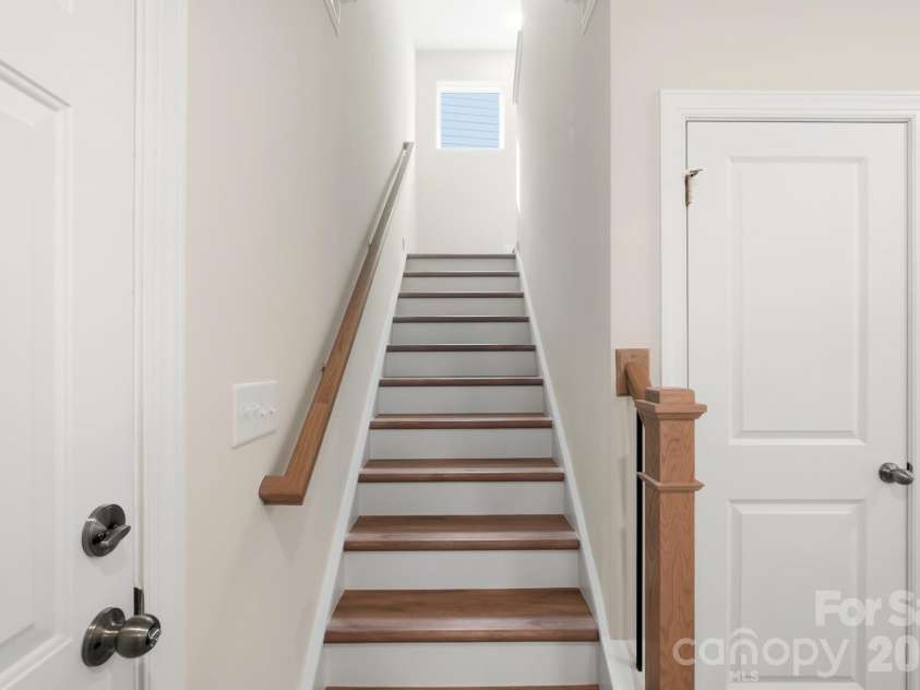 13123 Foxberry Road, Charlotte, NC 28213.  MLS# CAR4373503, YatesRealty ID 24472. Stairs to second floor