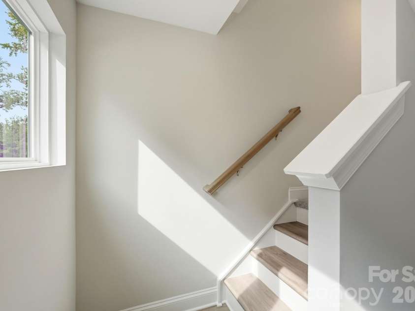 13123 Foxberry Road, Charlotte, NC 28213.  MLS# CAR4373503, YatesRealty ID 24472. Stairs to second floor
