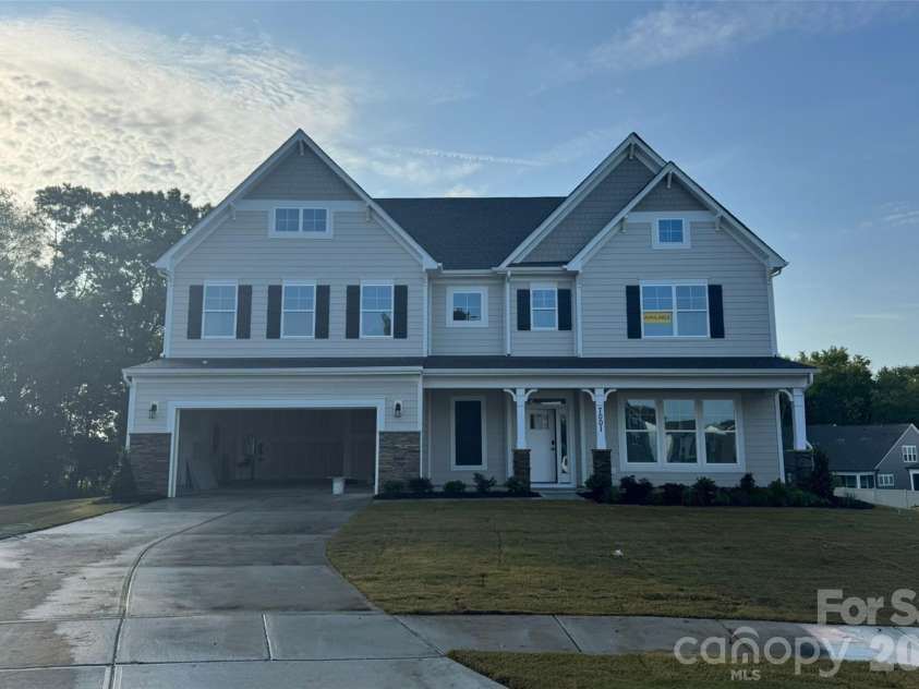 7001 Bil-Mar Drive, Harrisburg, NC 28075.  MLS# CAR4376666, YatesRealty ID 24474. Construction progress of Homesite 165 featuring a Waverly E floorplan